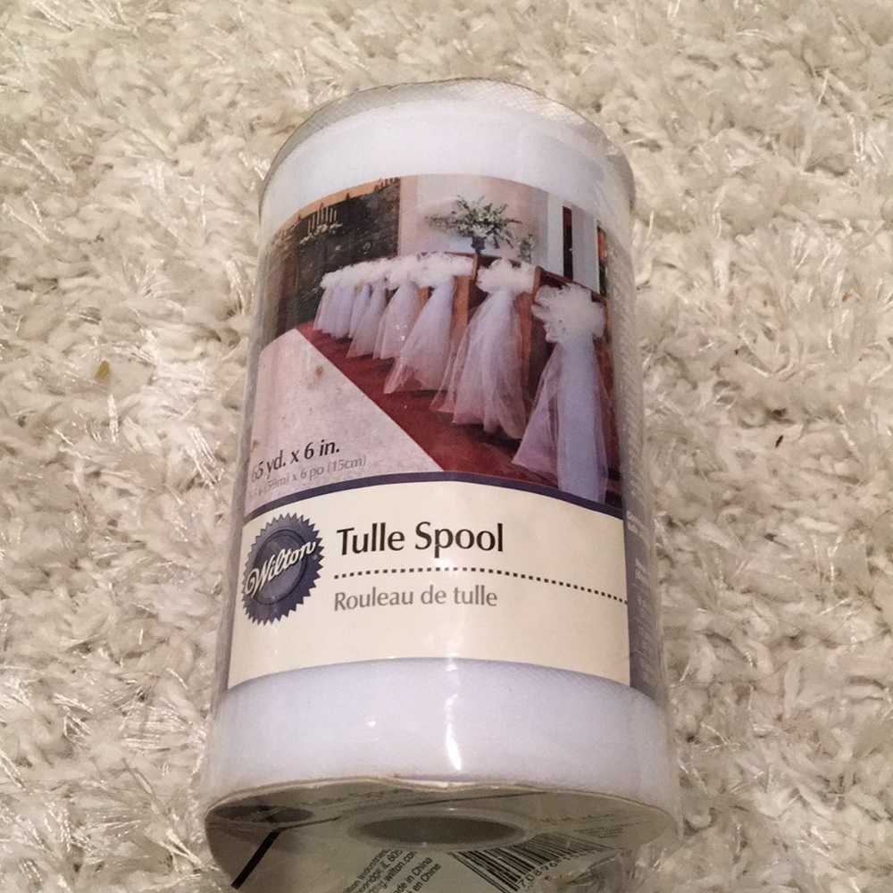 1 rolls of 6” wide White tulle 65 yrds